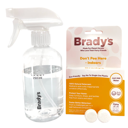 Brady's Don't Pee Here - Indoors. Bottle & Box next to each other and the concentrate tablets in front of the box